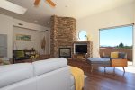 A stunning stone clad fireplace and Smart TV
